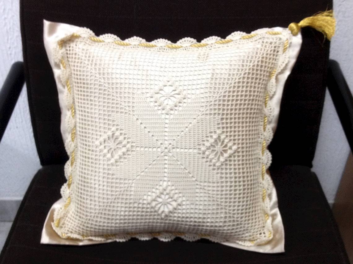 Hand-embroidered cushion